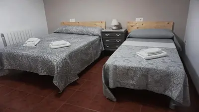 Cama o camas de una habitación en Casa rural torre chica