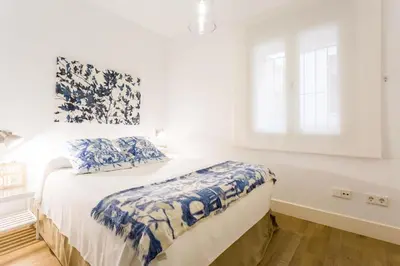 Cama o camas de una habitación en Atrivm San Julián Apartment
