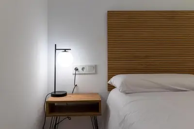 Cama o camas de una habitación en Apartamentos BN Suite Centro
