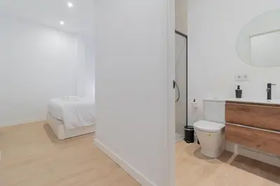 Cama o camas de una habitación en Apartamentos BN Suite Centro