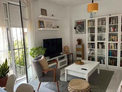 Una televisión o centro de entretenimiento en Wish Suite Macarena de Sevilla