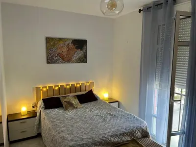 Cama o camas de una habitación en Wish Suite Macarena de Sevilla
