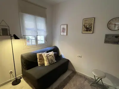Zona de estar de Wish Suite Macarena de Sevilla