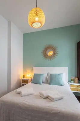Cama o camas de una habitación en Apartamento El Museo Écija