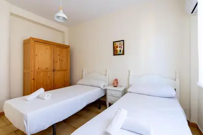 Cama o camas de una habitación en Apartamento Familiar María Auxiliadora