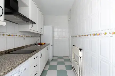 Una cocina o zona de cocina en Apartamento Familiar María Auxiliadora