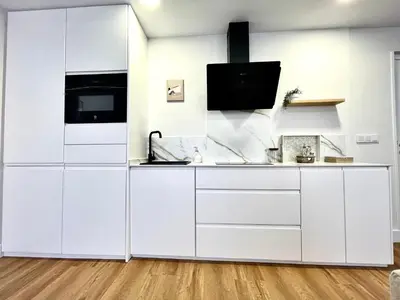 Una cocina o zona de cocina en House in City Garden 1