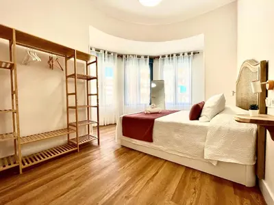 Cama o camas de una habitación en House in City Garden 1