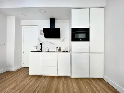 Una cocina o zona de cocina en House in City Garden 2