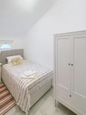 Cama o camas de una habitación en La Cofia