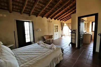 Cama o camas de una habitación en Villa Escutia