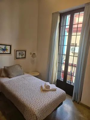 Cama o camas de una habitación en Castellar Life pleno centro