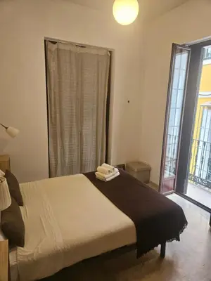 Cama o camas de una habitación en Castellar Life pleno centro