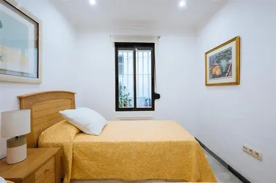 Cama o camas de una habitación en VIVIENDA TURISTICA ATANASIO BARRON- Free PARKING