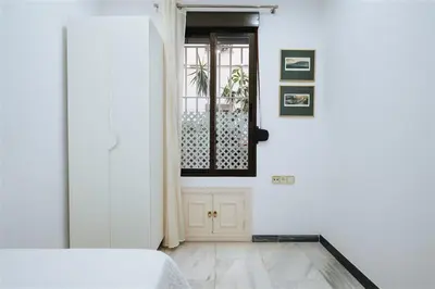 Cama o camas de una habitación en VIVIENDA TURISTICA ATANASIO BARRON- Free PARKING