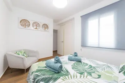 Cama o camas de una habitación en La Ribera y Feria - Casabel Homes