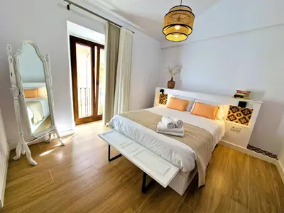 Cama o camas de una habitación en NOVOJAÉN Alojamientos 2 - Edificio vacacional Exclusivo y Tranquilo junto a Catedral