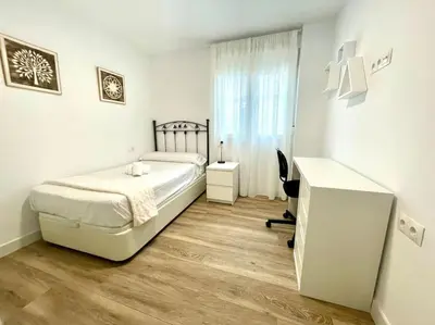 Cama o camas de una habitación en Geysotur Suite Santa Rosa