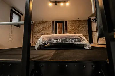 Cama o camas de una habitación en Bajo el Sol de Sevilla
