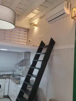 Una cocina o zona de cocina en Coliseo setas