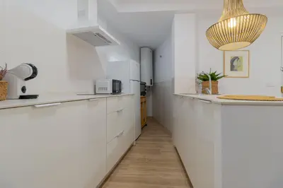 Una cocina o zona de cocina en Apartamento Conde y Luque