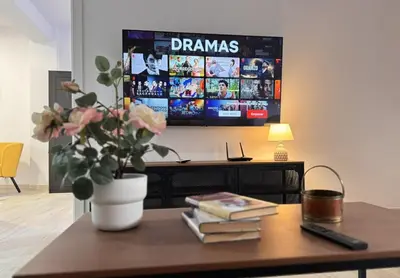 Una televisión o centro de entretenimiento en A un paso de la Basilica Macarena WIFI