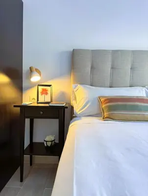 Cama o camas de una habitación en A un paso de la Basilica Macarena WIFI
