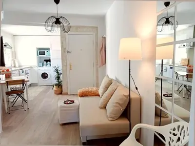 Zona de estar de 2BDR y 1 SALON Bonito y práctico apartamento en la Muralla