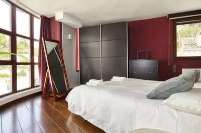 Cama o camas de una habitación en Casa del Álamo