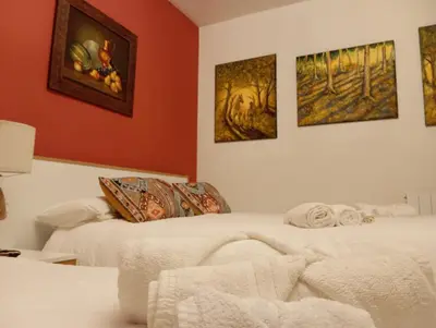 Cama o camas de una habitación en Casa Rural Río Frío