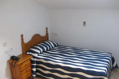 Cama o camas de una habitación en Campomar se encuentra