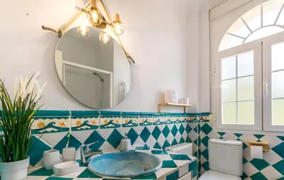 Un baño de Villa Carmela