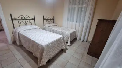 Cama o camas de una habitación en Villa Carmela