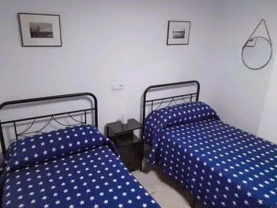 Cama o camas de una habitación en Plaza San Fernando