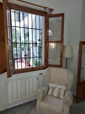 Zona de estar de Patio Sevillano Flores