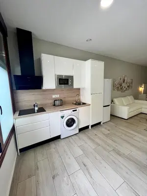 Una cocina o zona de cocina en Califa SuitesGP 5