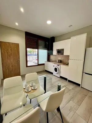 Una cocina o zona de cocina en Califa SuitesGP 5