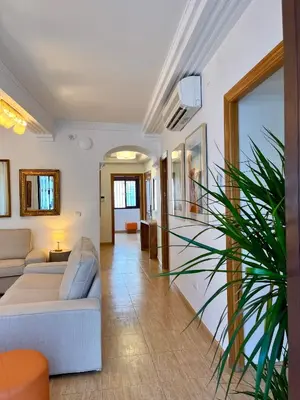 Zona de estar de Apartamento 1 by MezquitaSuites
