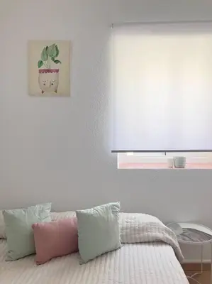 Cama o camas de una habitación en Renovated retro home w terrace