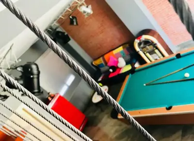 Mesa de billar en Precioso y moderno ático duplex de 2 habitaciones en Sevilla para 2 ó 3 personas con Jacuzzi