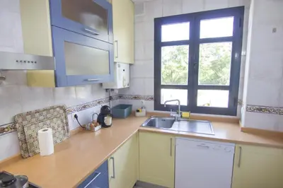 Una cocina o zona de cocina en RentalSevilla Marqués de Estella
