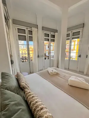 Cama o camas de una habitación en Wanderlust Apartments