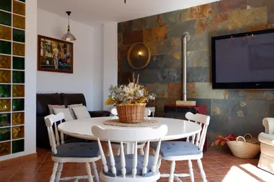 Una televisión o centro de entretenimiento en Casa Frasquita del Pan - Caminito del Rey