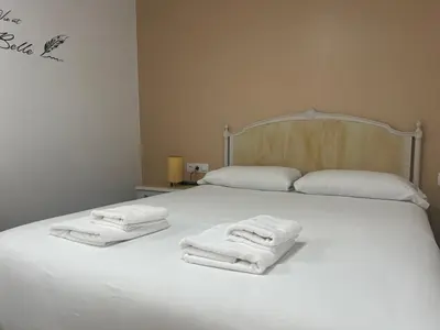 Cama o camas de una habitación en RentalSevilla Cardenal Rodrigo de Castro