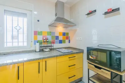 Una cocina o zona de cocina en Blue Gardenia Apartmento en Sevilla