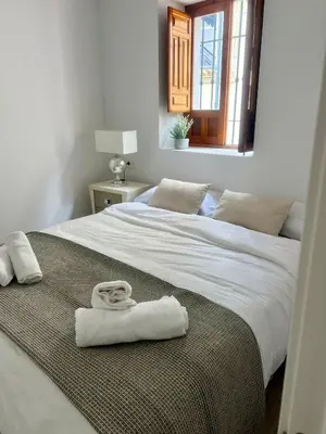 Cama o camas de una habitación en Apartamento Turístico Antequera Centro