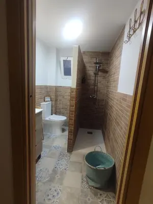 Un baño de Olivia