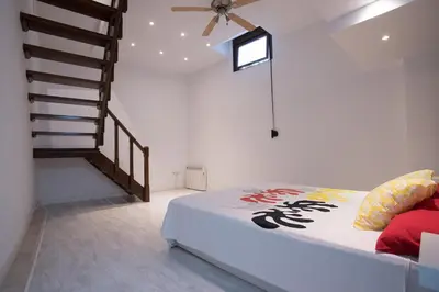 Cama o camas de una habitación en Alohamundi Amador de los Rios