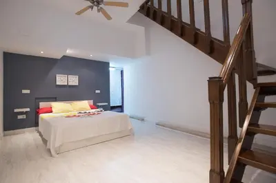 Cama o camas de una habitación en Alohamundi Amador de los Rios