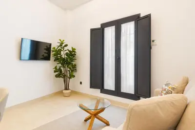 Una televisión o centro de entretenimiento en New Design Apartment - Gallos 1